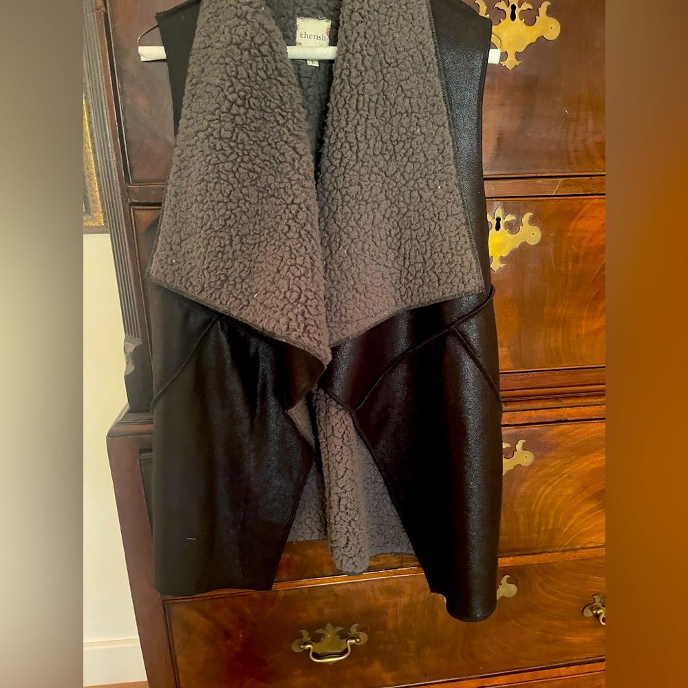 Faux leather vest lined with fleece